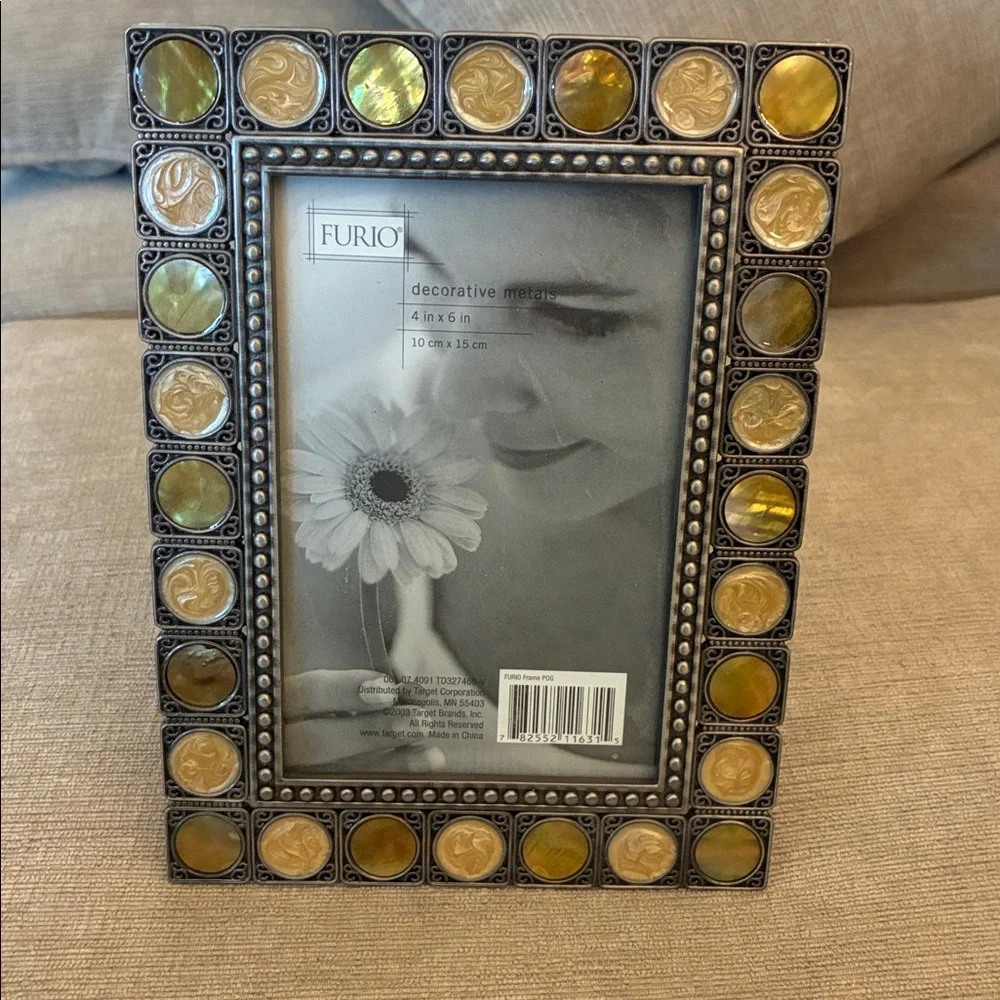Furio Decorative Metals Standing Photo Frame with Accents holds 4”x 6” photo